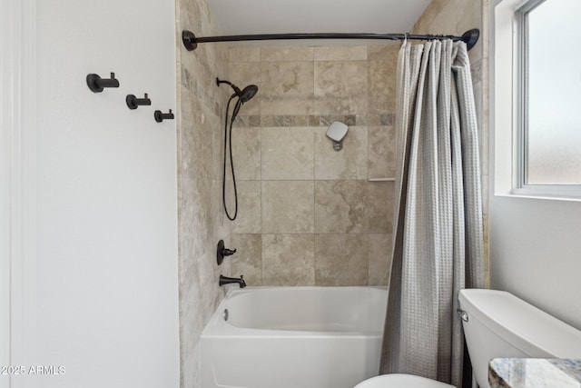 bathroom featuring toilet and shower / bathtub combination with curtain