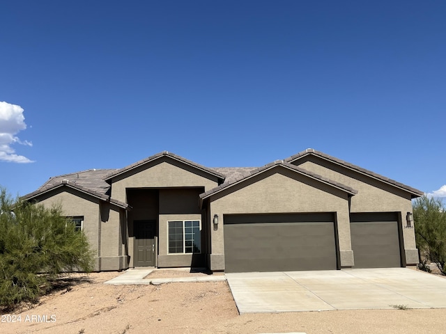 view of front of home featuring a garage