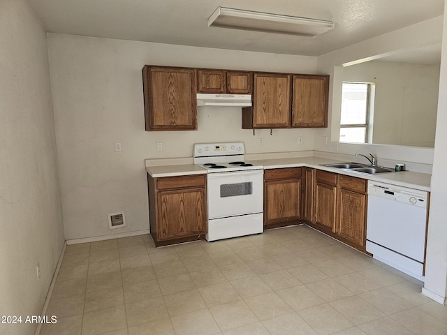 kitchen with white appliances and sink