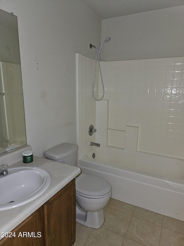 full bathroom featuring toilet, bathtub / shower combination, vanity, and tile patterned floors