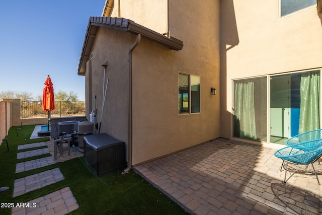 rear view of property with a patio