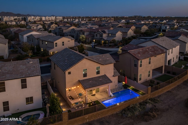 view of aerial view at dusk