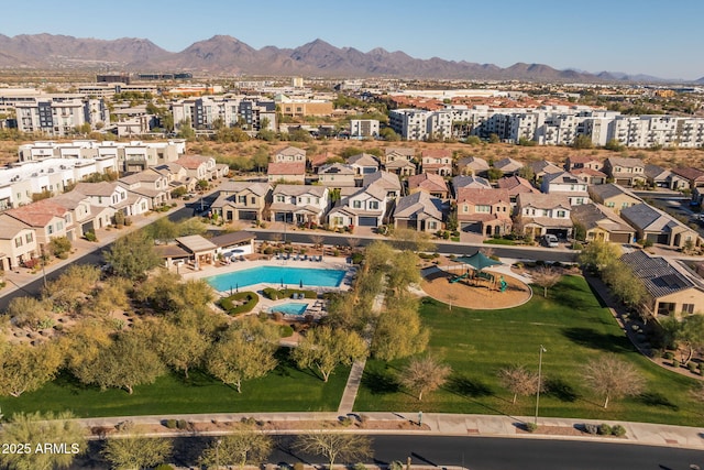 birds eye view of property featuring a mountain view