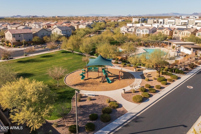 birds eye view of property featuring a mountain view