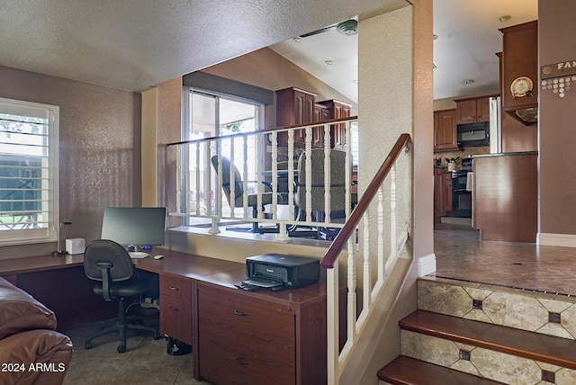 office space with tile patterned flooring