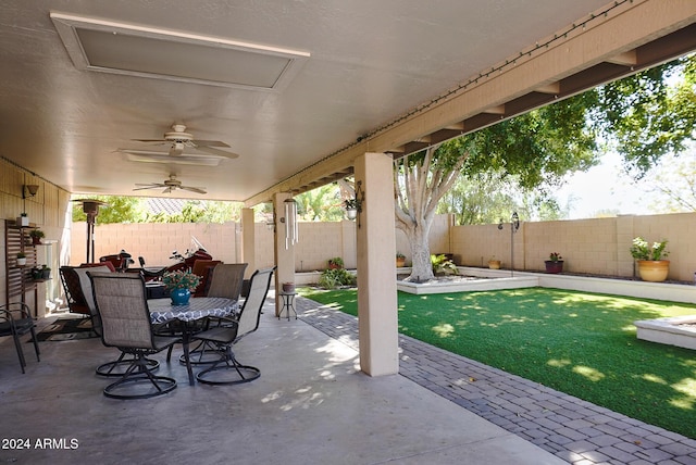 view of patio featuring ceiling fan