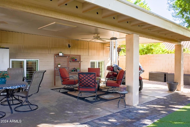 view of patio / terrace featuring ceiling fan