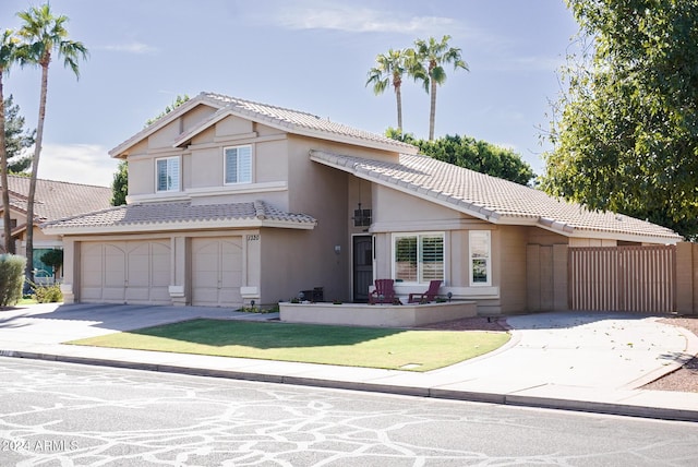 view of front of home with a garage