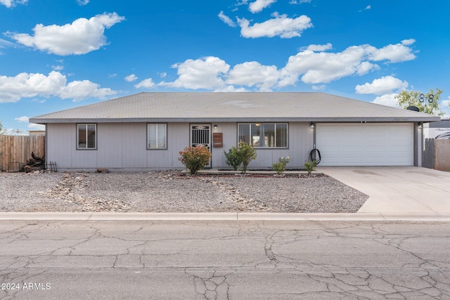 single story home with a garage