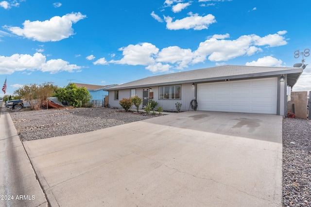 single story home with a garage