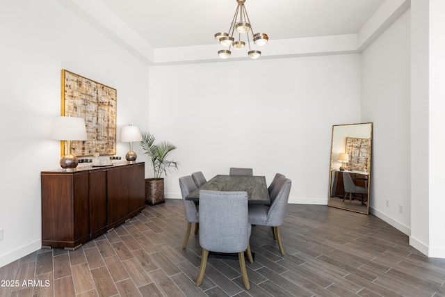 dining area with a notable chandelier