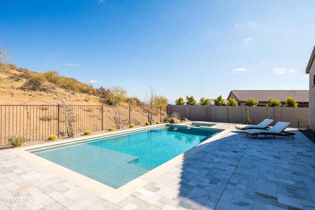 view of pool with a patio