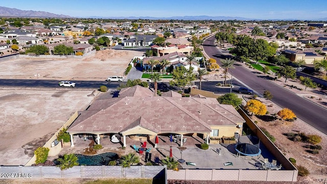 birds eye view of property featuring a mountain view