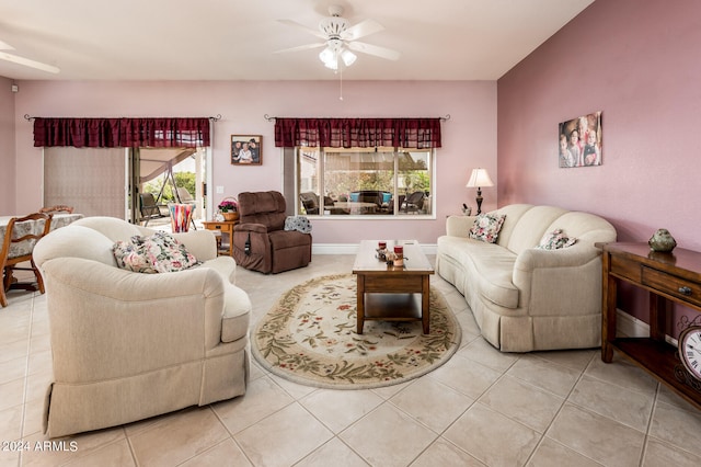 tiled living room featuring ceiling fan