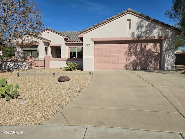 view of front of home with a garage