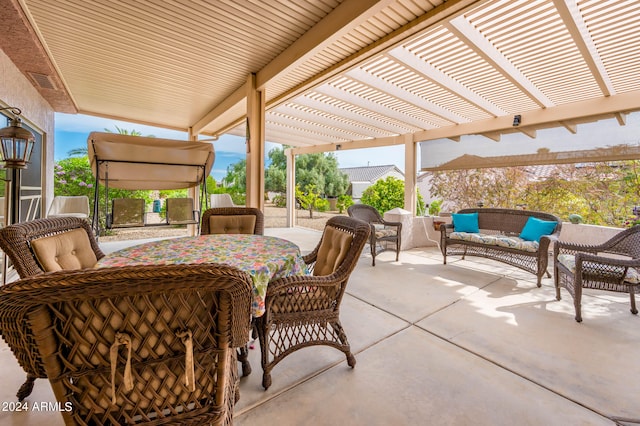 view of terrace featuring a pergola and an outdoor hangout area