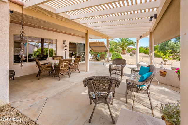 view of terrace featuring an outdoor hangout area and a pergola