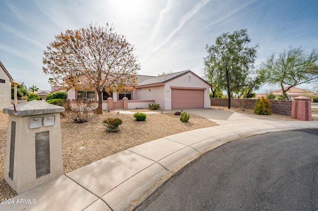 view of front of home with a garage