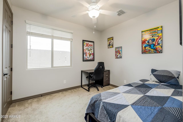 bedroom featuring visible vents, light colored carpet, baseboards, and ceiling fan