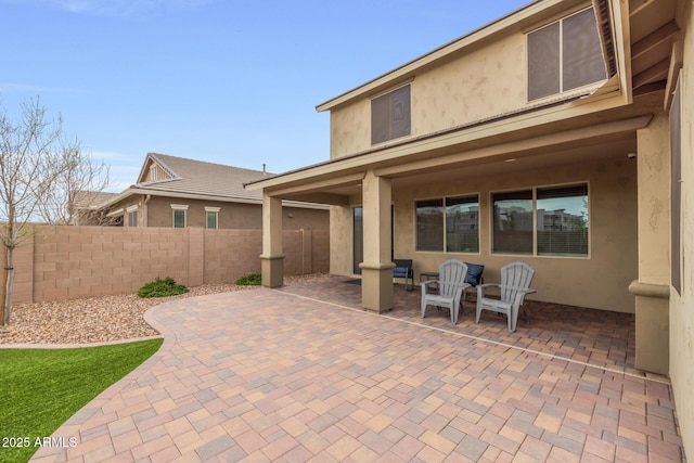 view of patio / terrace with fence