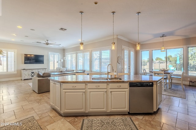 kitchen featuring a healthy amount of sunlight, sink, an island with sink, and stainless steel dishwasher