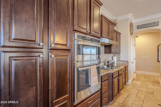 kitchen featuring stainless steel double oven, tasteful backsplash, light stone counters, black electric stovetop, and ornamental molding