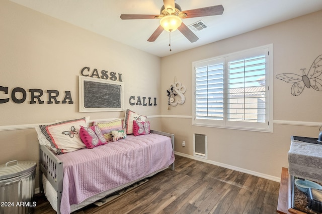 bedroom featuring ceiling fan and dark hardwood / wood-style flooring