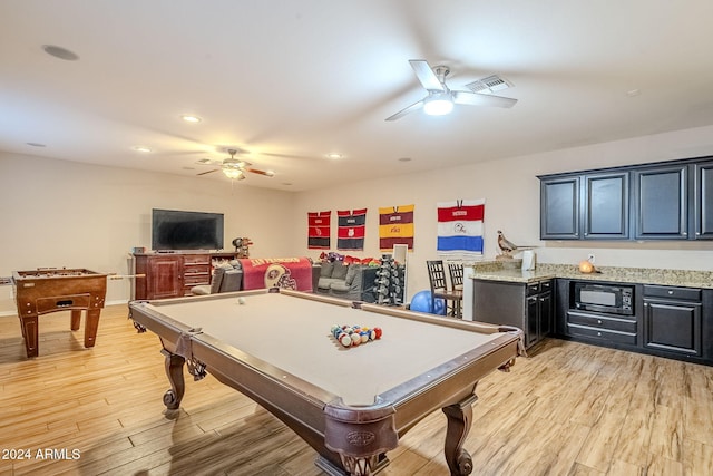 rec room with ceiling fan, light hardwood / wood-style floors, and billiards