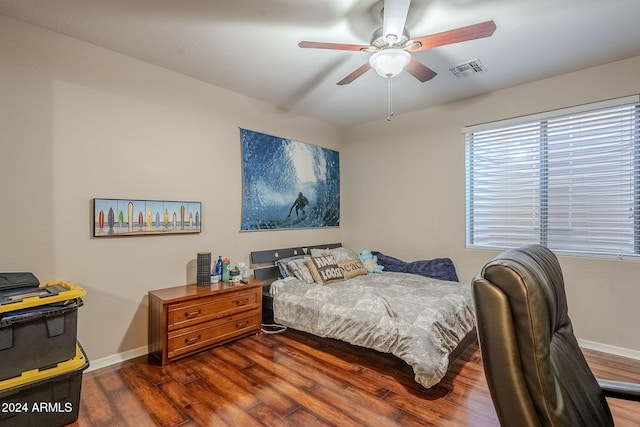 bedroom featuring ceiling fan and hardwood / wood-style flooring