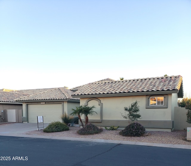 view of side of property with a garage