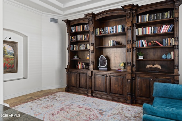 living area featuring visible vents and baseboards