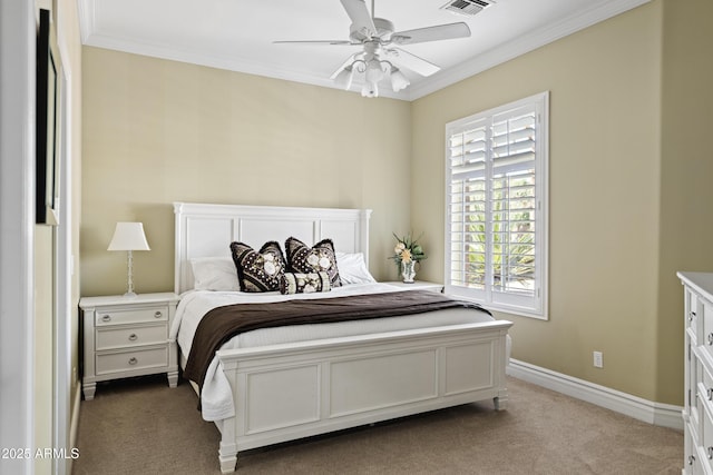 bedroom featuring baseboards, visible vents, ceiling fan, ornamental molding, and carpet floors