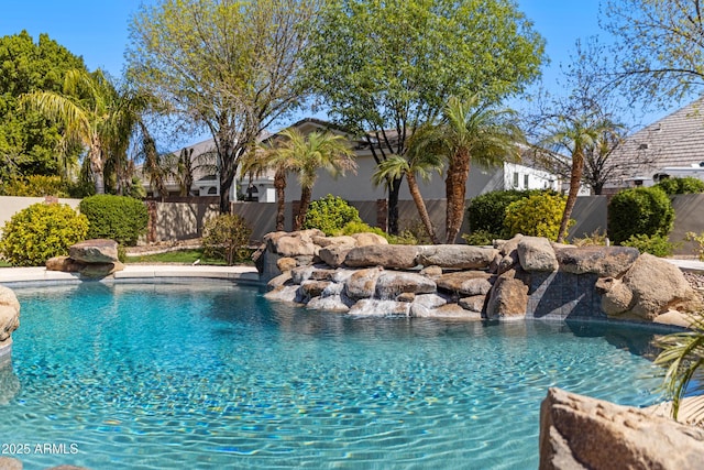 view of pool with a fenced backyard and a fenced in pool