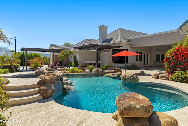 pool with ceiling fan, french doors, and a patio area