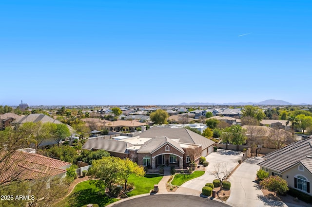 birds eye view of property featuring a residential view and a mountain view