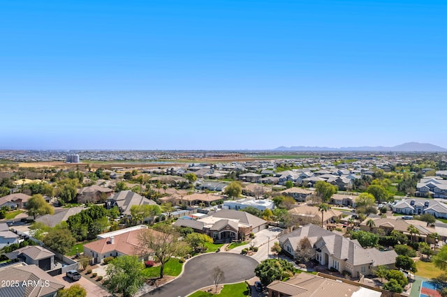 drone / aerial view with a residential view and a mountain view