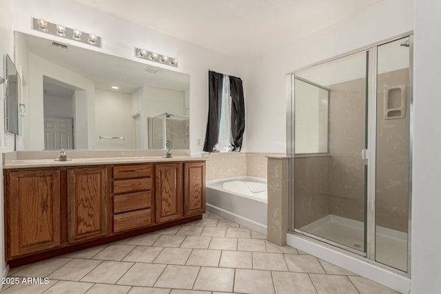 15429 W Ventura St, Surprise, AZ 85379 - bathroom with a bath, a stall shower, and double vanity