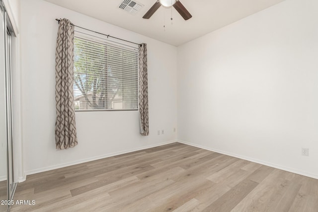 15429 W Ventura St, Surprise, AZ 85379 - empty room with wood finished floors and a ceiling fan
