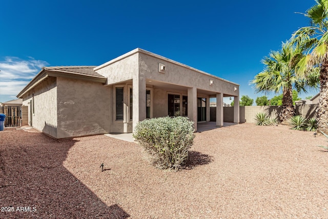 15429 W Ventura St, Surprise, AZ 85379 - rear view of house with a patio area and stucco siding