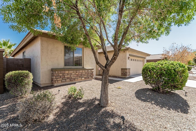 15429 W Ventura St, Surprise, AZ 85379 - view of front facade with stucco siding and an attached garage