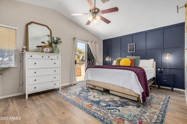 bedroom featuring a ceiling fan, visible vents, light wood-style flooring, access to exterior, and vaulted ceiling