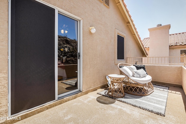 view of patio / terrace with visible vents and a balcony