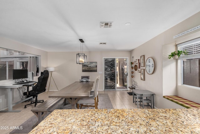 office space with tile patterned floors and visible vents