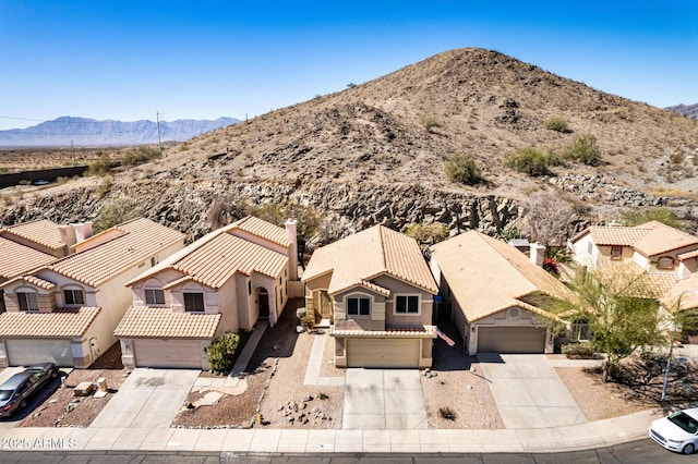 aerial view with a mountain view and a residential view