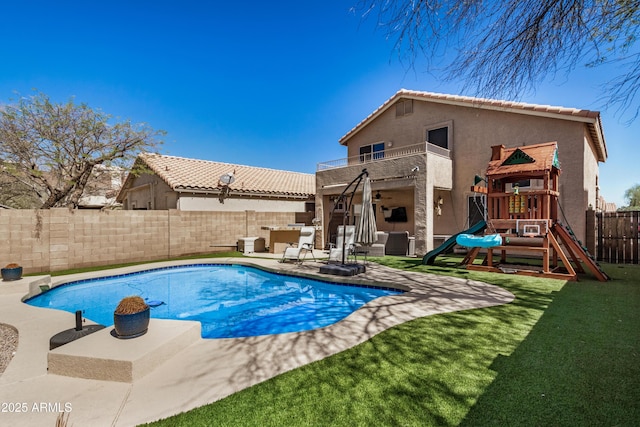 view of swimming pool featuring a fenced backyard, a playground, a fenced in pool, ceiling fan, and a patio area