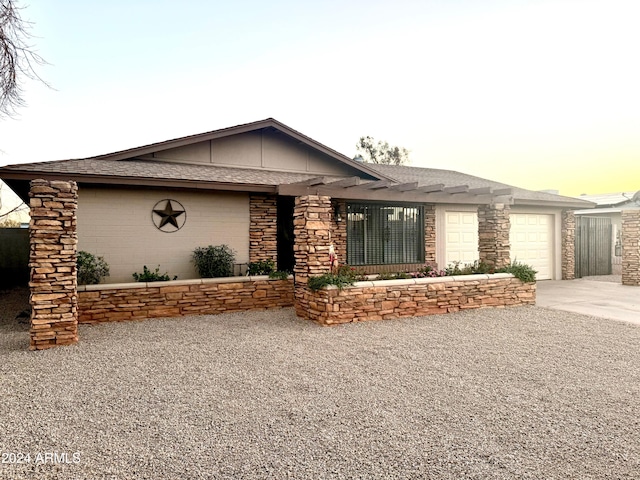 view of front of property with a garage