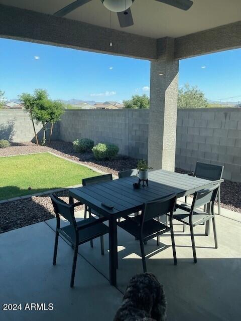 view of patio featuring ceiling fan