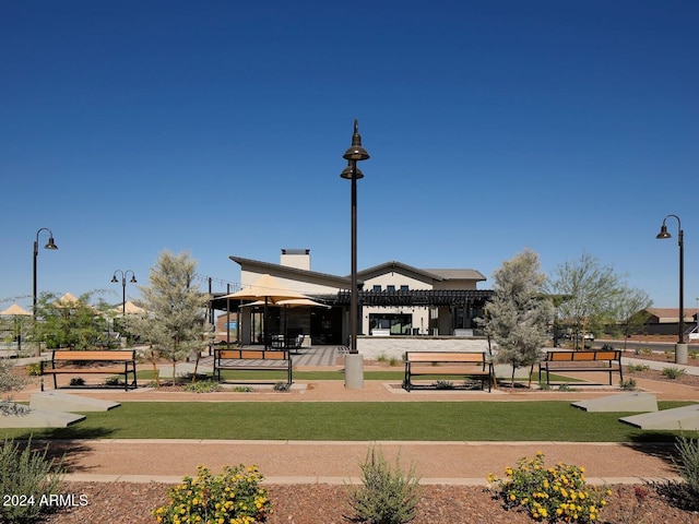 view of community featuring a yard