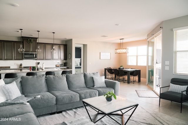 living room featuring light tile patterned flooring