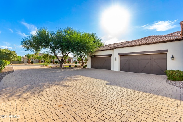 exterior space featuring a garage